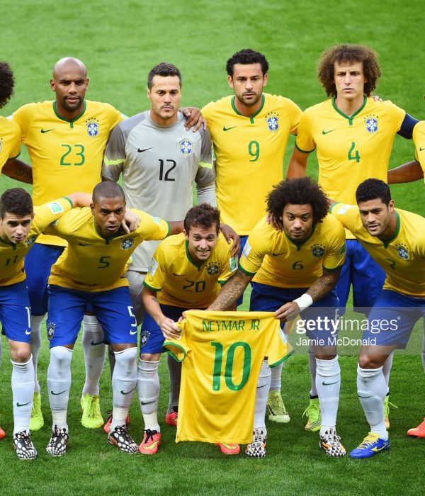 BELO HORIZONTE, BRAZIL - JULY 08: Brazil pose for a team photo holding a Neymar jersey prior to the 2014 FIFA World Cup Brazil Semi Final match between Brazil and Germany at Estadio Mineirao on July 8, 2014 in Belo Horizonte, Brazil.  (Photo by Jamie McDonald/Getty Images)